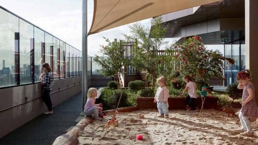 Children playing in sandpit at Taringa