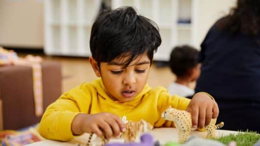 kid-playing-with-toys-600x400