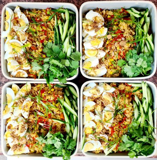 Four serves of vegetarian Nasi Goreng